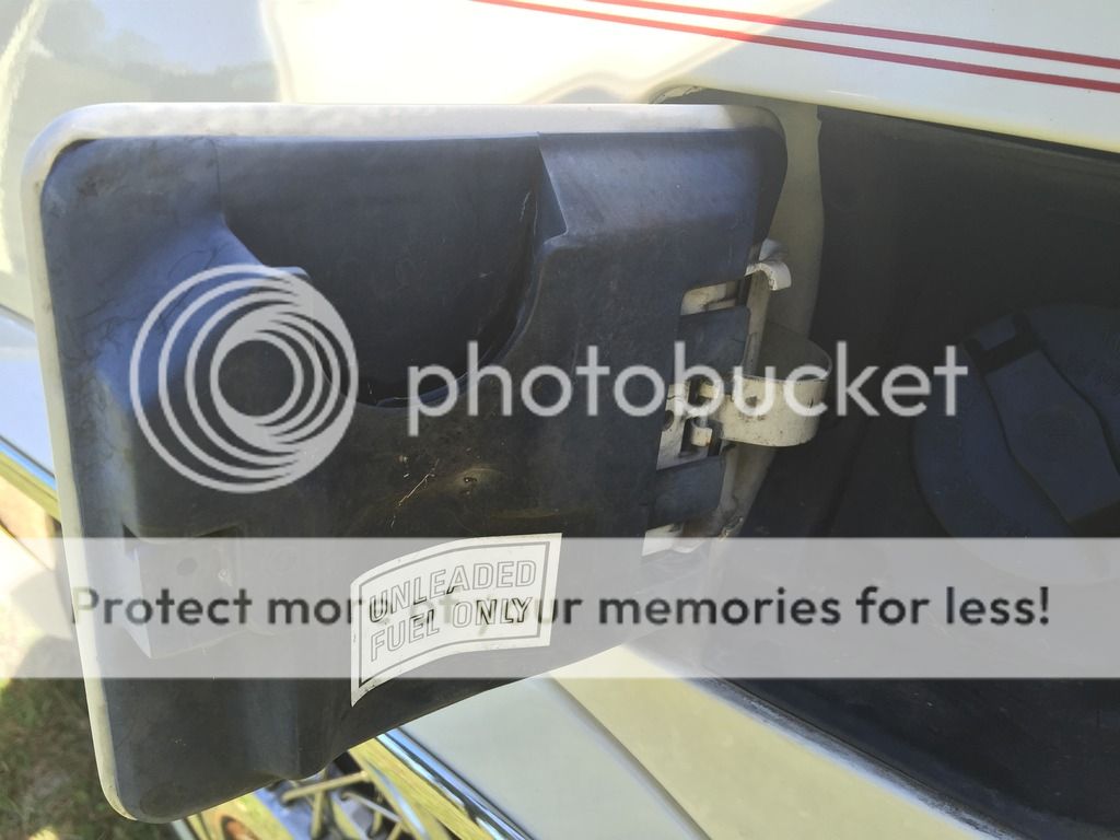 89 DeVille fuel door not closing flush Cadillac Owners Forum